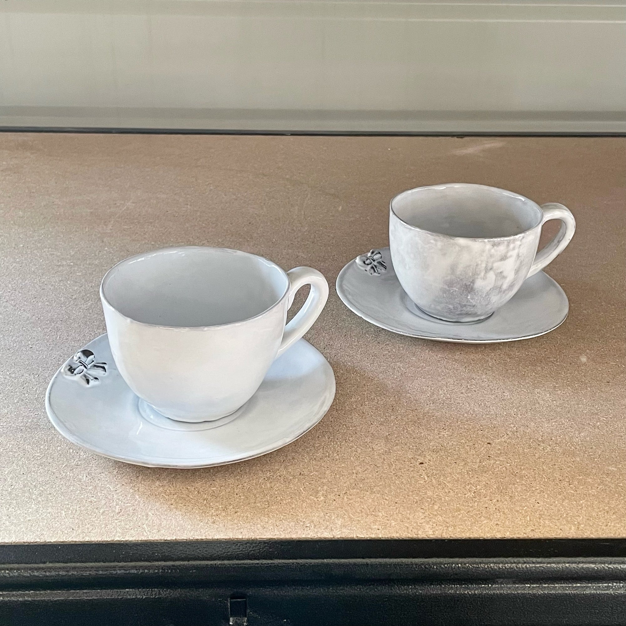 2x Cups and saucers set