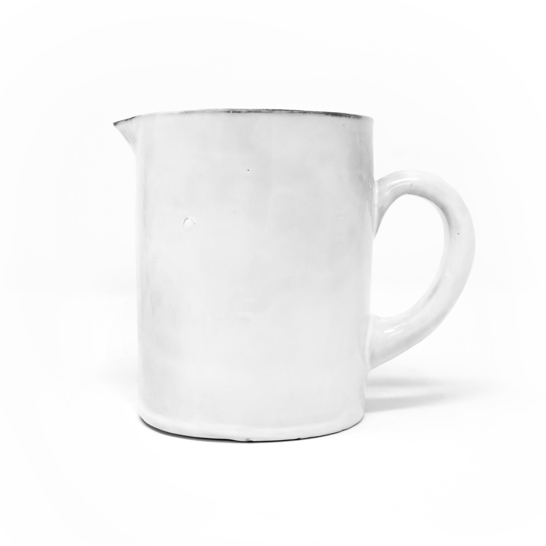 Handmade white ceramic pitchers